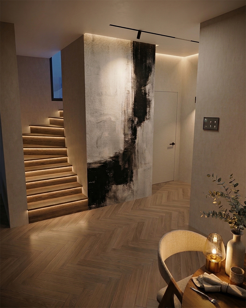 Tapeta czarno biała w salonie obok schodów